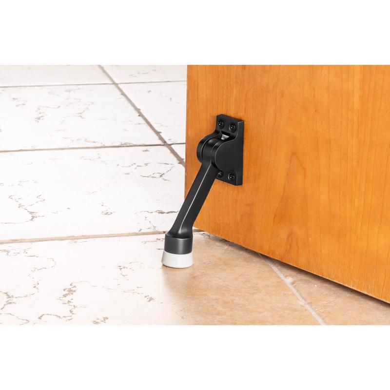 Brinks Commercial Steel Matte Brass/Black Kick-Down Door Holder Mounts to door 1 in.