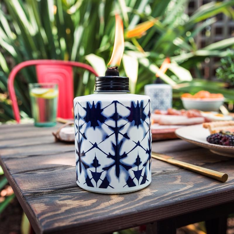 TIKI Blue/White Glass 5.75 in. Tiedye Tabletop Torch 1 pc
