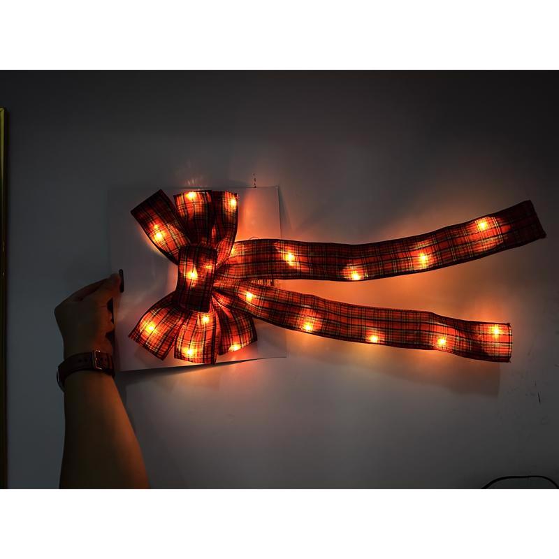 Lin-Con Marketing Omega Bright Designs 10 in. D X 1.5 ft. L LED Prelit Warm White Plaid Bow Garland