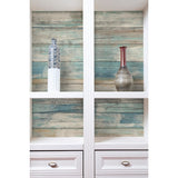 RoomMates 20.5 in. H X 16.5 ft. L Distressed Wood Blue Vinyl Peel and Stick Wallpaper