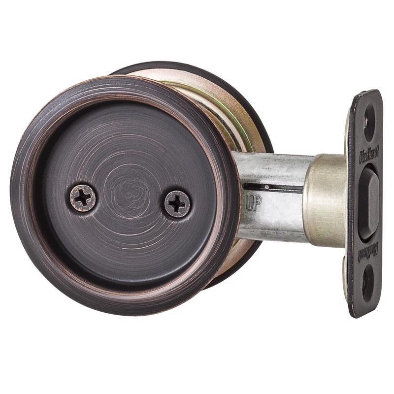 Kwikset Oil Rubbed Bronze Metal Indoor Round Pocket Door Lock