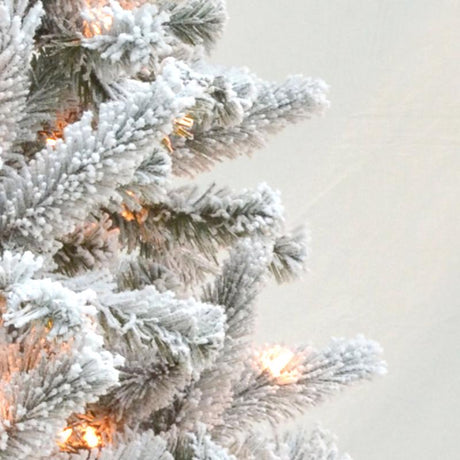 Celebrations 7-1/2 ft. Slim Incandescent 300 lights Flocked Fir Christmas Tree