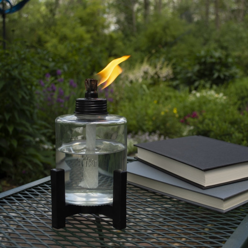 TIKI Black/Clear Glass/Metal 6.5 in. Elevated Tabletop Torch 1 pc