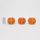 Gerson 4.5 in. Set of 3 Lighted Resin Halloween Pumpkins with Remote Hanging Decor