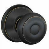 Schlage Georgian Aged Bronze Passage Lockset 1-3/4 in.